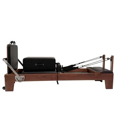 High stability Premium Walnut Pilates Reformer — Built for Professional Studio Use